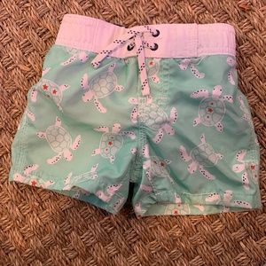 Baby Gap swim trunks, 12-18M